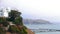 Barranco south view from the Lima coast with a marina in the Pacific Ocean and a modern building over a cliff