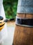 Barrel restoration, a man painting an old wine barrel. Half barrel for plants