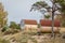 Barrel sun houses on the sand dunes in Kolka, Latvia beach