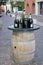 Barrel table with wine at the street