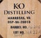 Barrel with whiskey in craft distillery