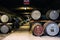 Barrels of whisky inside Brora Distillery warehouse in Scotland, rare Brora whisky in the front.