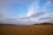 Barren arid desert after sunset