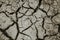 Barren cracked soil background at dry season