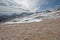 Barren landscape of gravel and snow