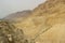 The barren mountainous wilderness at Qumran the historic archaeological site of the Dead Sea Scrolls in Israel