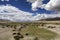 A barren plateau meadow below the mountain