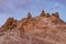 Barren Rocky Mountains with rocky peaks blue sky