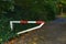 A barrier blocking the path in the park. Autumn