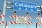 Barriers near Culiacan city traffic sign. Lockdown in Mexico conceptual 3D rendering
