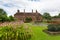 Barrington Court near Ilminster Somerset England uk with gardens in summer sunshine