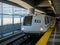 BART bay area rapid transit train pulling in at SFO airport stop