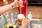 Bartender brewing draft beer in pub