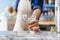 Bartender gently grab a wine glass for making cocktail