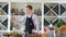 The bartender prepares a berry cocktail on the terrace of the restaurant