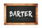 BARTER text written on wooden frame school blackboard