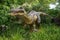 Baryonyx standing in tall grass display model in Perth Zoo
