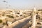 Barzan old watchtowers and a modern mosque. Old Ancient Arabian fortification, Qatar. Middle East. Persian Gulf.