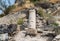 The bas-relief of the cross on the remains of the column in ruins of Kursi - a large Byzantine 8th-century monastery on the shores