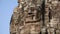 Bas-relief of the face in Bayon - ancient Khmer temple in Angkor Thom temple complex, Cambodia