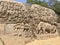 Bas relief rock cut sculptures of Gods, people and animals carved in monolithic rock 