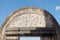 Bas relief at the top of gate in pulo cemeti, taman sari water castle - the royal garden of sultanate of jogjakarta