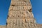 Bas relief on the wall of ruins in the Persepolis in Shiraz, Iran. The ceremonial capital of the Achaemenid Empire. UNESCO World