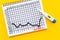 Basal ovulation temperature chart with thermometer, top view