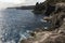 Basalt lava coastline rocks and cliffs at the Ponta do MistÃ©rio viewpoint on Ilha Terceira Island on the Azores