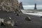 Basalt rock columns on the volcanic black beach at Vik, Iceand