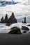 Basalt rock formations Troll toes on black beach. Reynisdrangar, Vik, Iceland