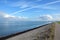 Basalt shore, estuary and bridge