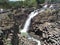 Basaltic prisms and waterfall of Santa MarÃ­a Regla, Mexico.