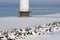 Base of a big offshore windturbine in a frozen sea