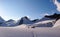 Base camp with many tents on a high alpine glacier in the Alps near Chamonix