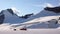 Base camp with many tents on a high alpine glacier in the Alps near Chamonix