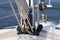 The base for securing the mainsail on the deck of a cruise yacht. Folding carriages and ropes for raising sails. Bermuda sloop