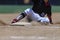 Baseball Action Image - Feet first slide into base