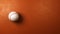 Baseball Ball Rotating on Brown Orange Background with Copyspace