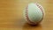 Baseball ball on a wooden background