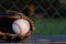 Baseball in glove from dugout