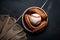 Baseball gloves and ball isolated on dark background. Flat lay.