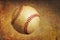 A baseball on a grunge textured background