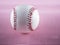 Baseball over pink background