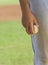 Baseball pitcher holding ball
