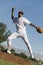 Baseball Pitcher Throwing Ball During Game