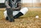 Baseball player, stretching legs and athlete black man on sports field doing warm up exercise, workout and practice for