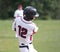 Baseball player swinging at ball