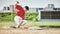 Baseball, sports and man slide on field for competition, game or practice outdoors. Training, workout and player
