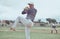 Baseball, sports and man throwing a ball during a professional game on a field with a team. Athlete pitching during an